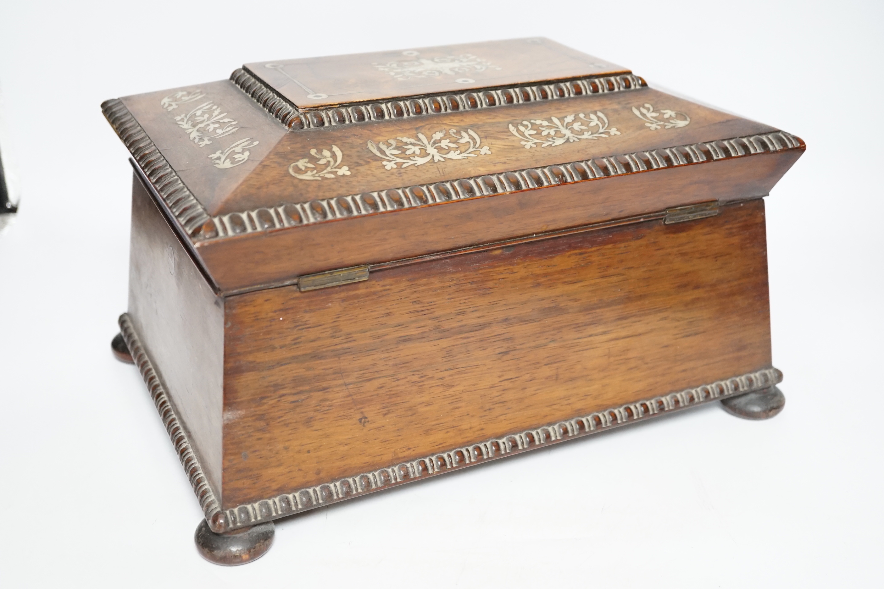 A William IV mother of pearl inlaid rosewood jewellery casket, 30cm wide